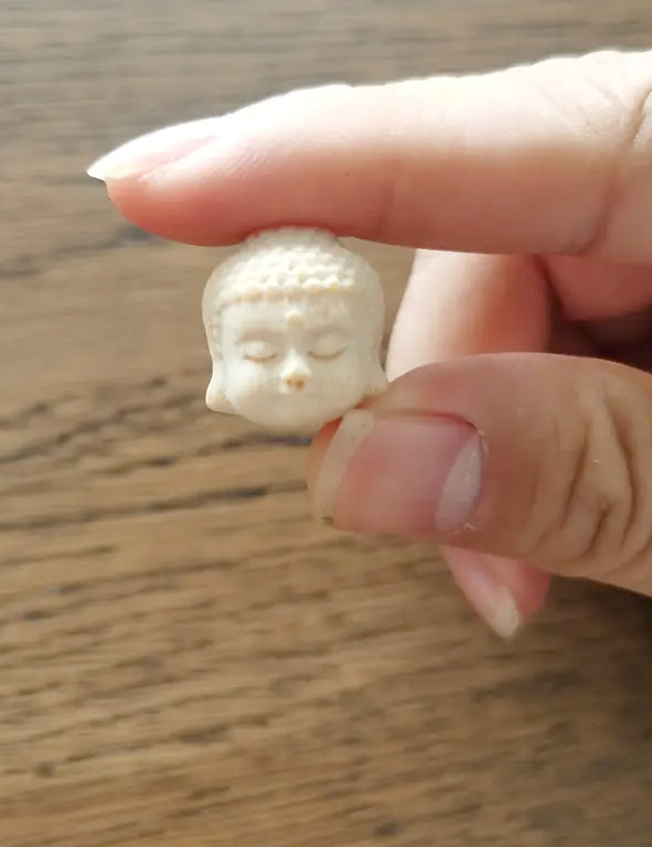 Mini testa di Buddha decorativa