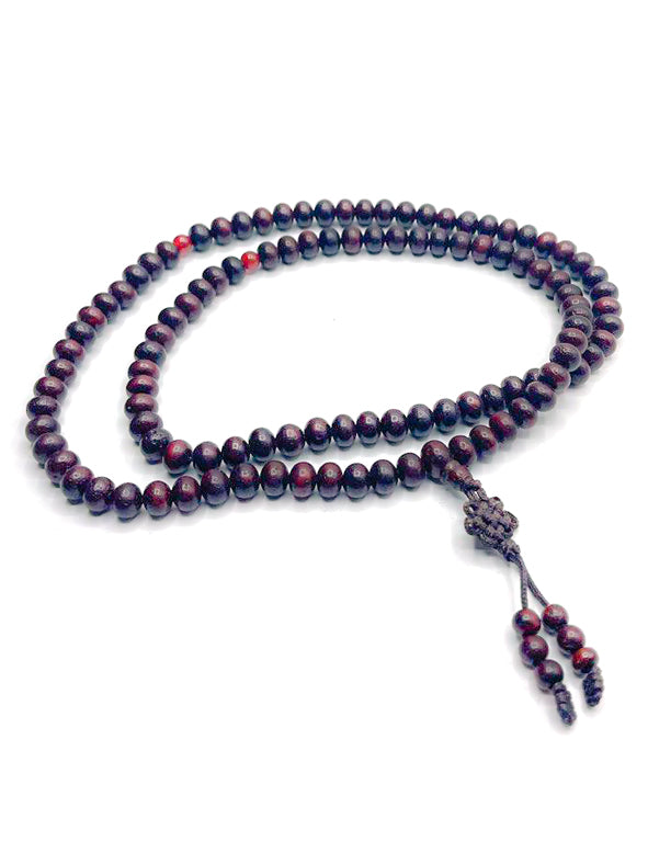 Mala in legno scuro con perle di corniola