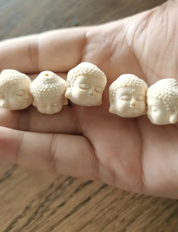 Mini testa di Buddha decorativa